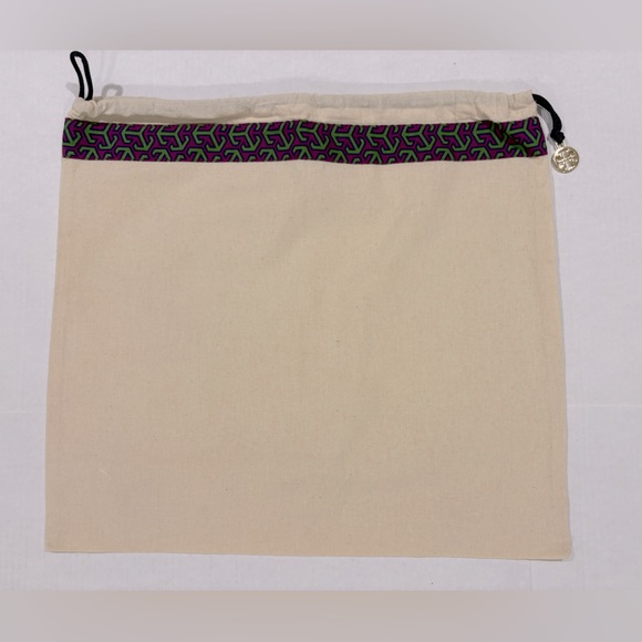 Tory Burch Accessories - Tori Burch Canvas Drawstring Bag with Patterned Trim And Charm